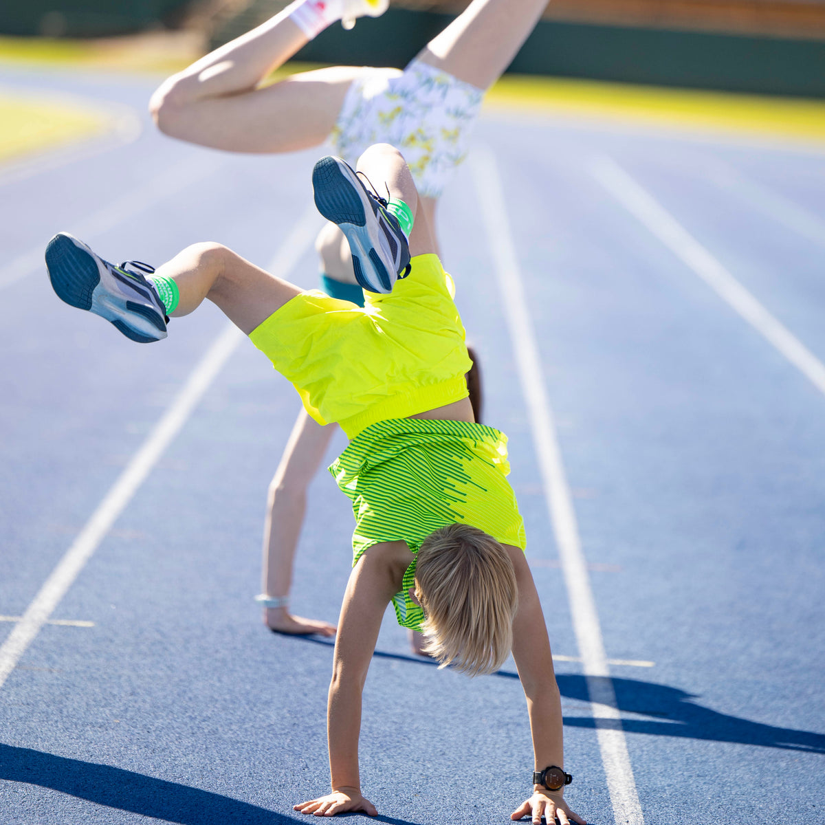 boys yellow running shorts