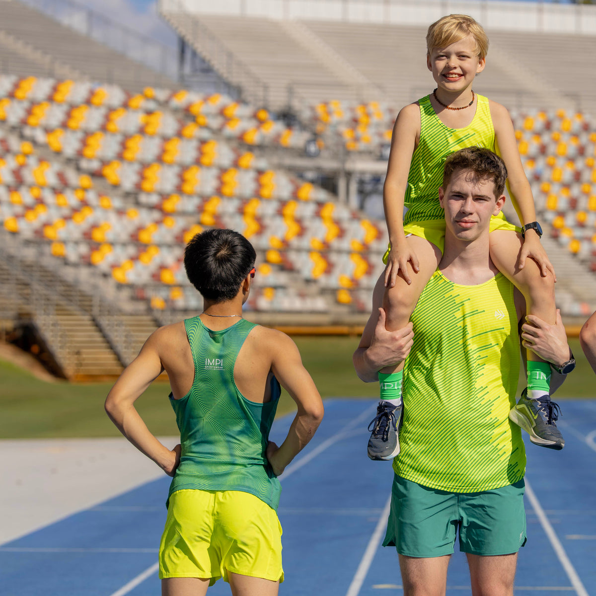 boys yellow running shorts