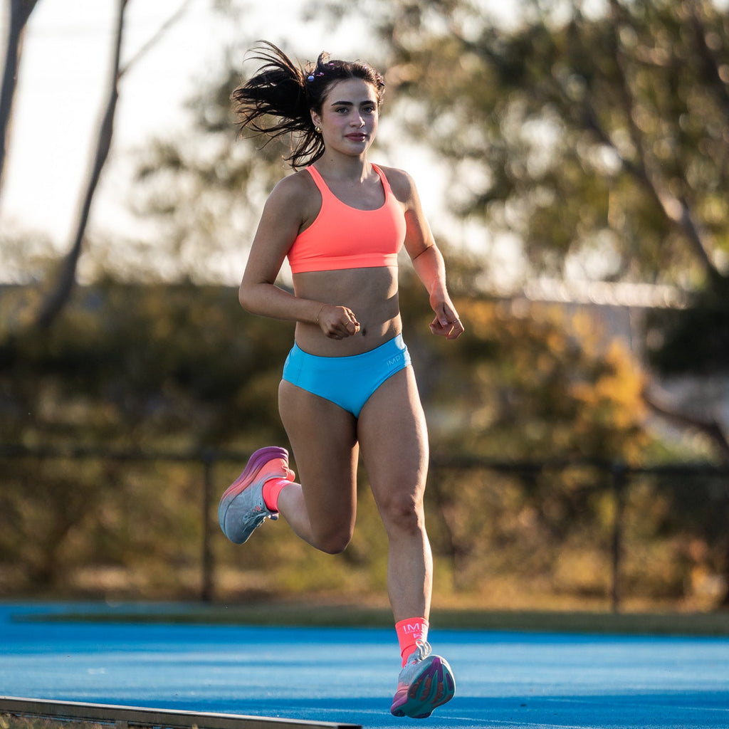 neon coral running crop