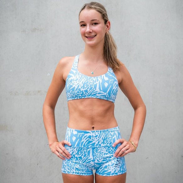 baby blue minx running crop