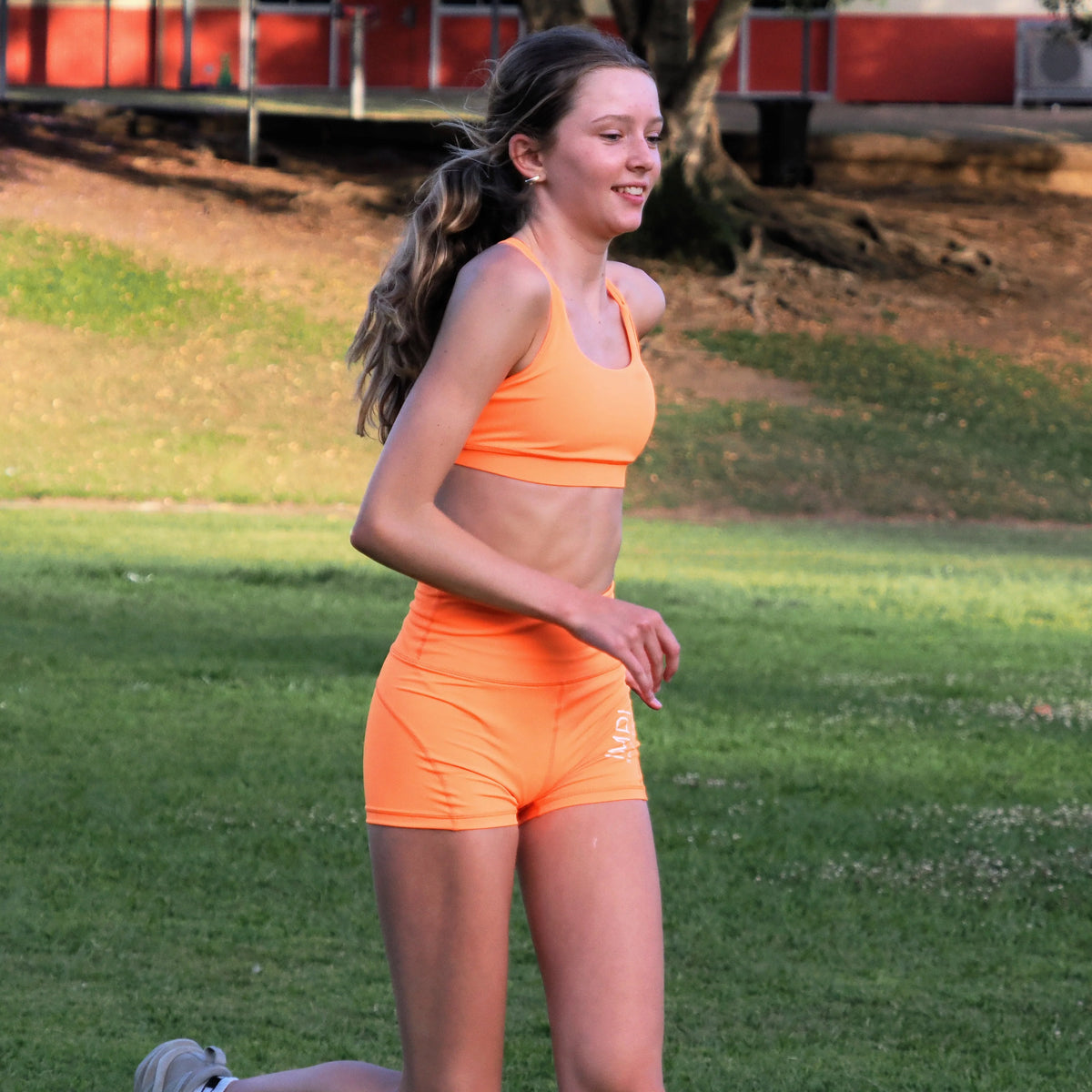 girls orange bike shorts