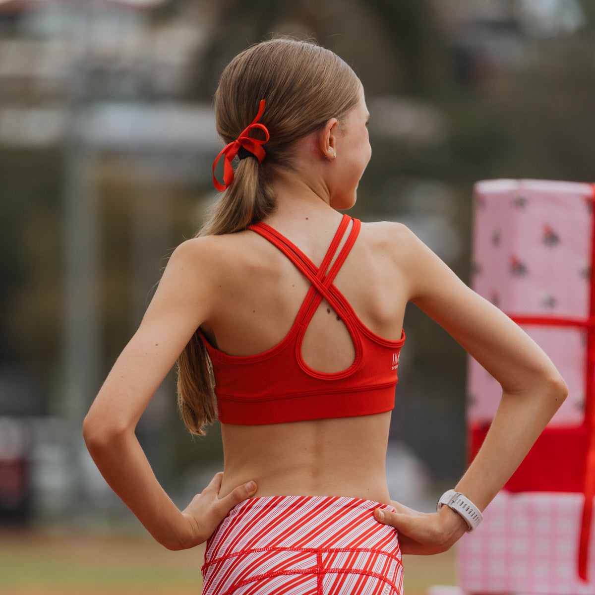 girls red sports bra