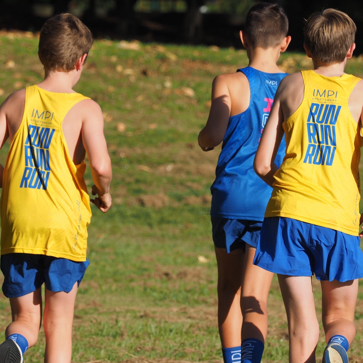 boys running singlets