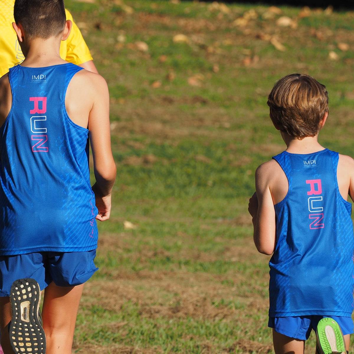 boys running singlet